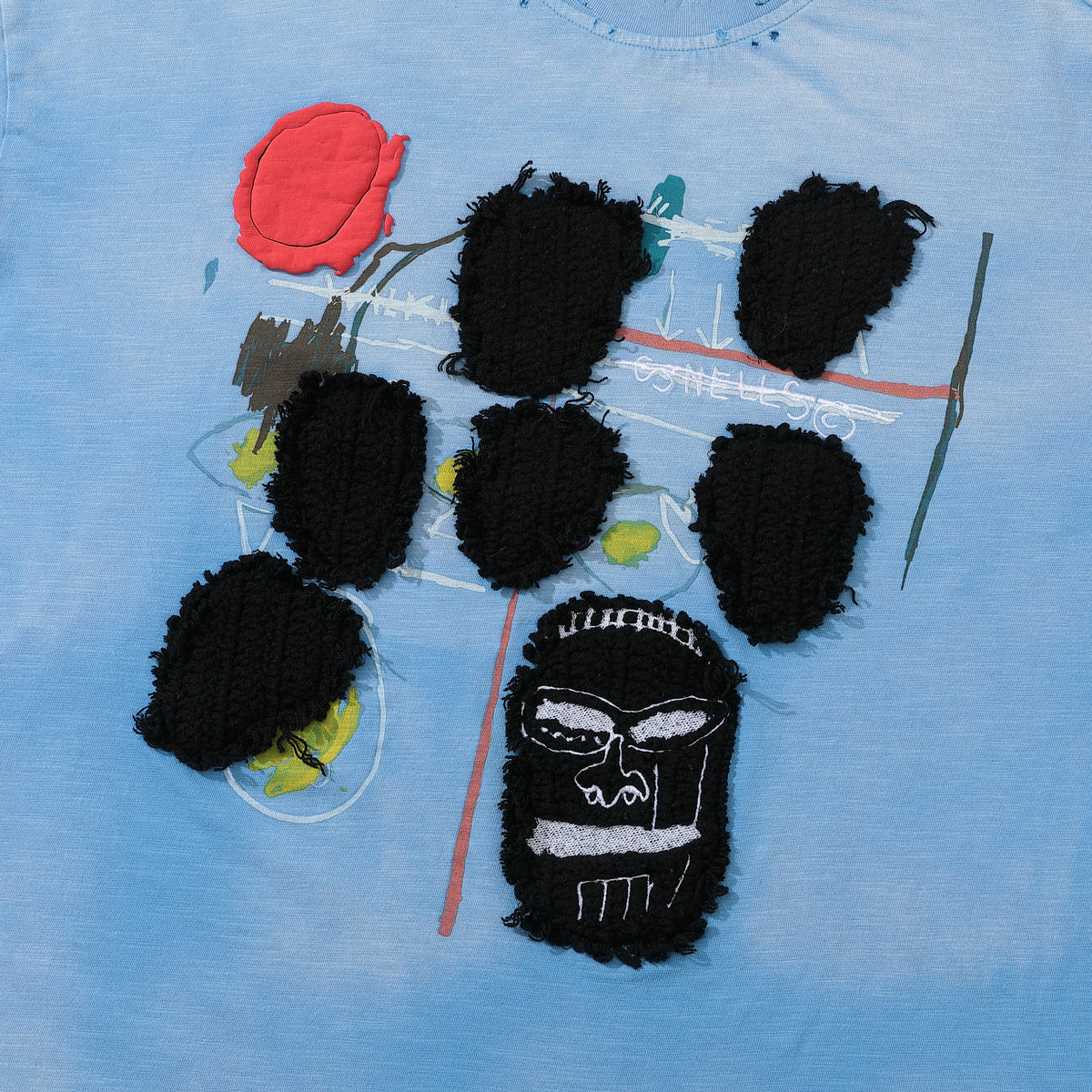 Arkyve X Basquiat Faces Long Sleeve in blue, hand-crocheted detail close-up
