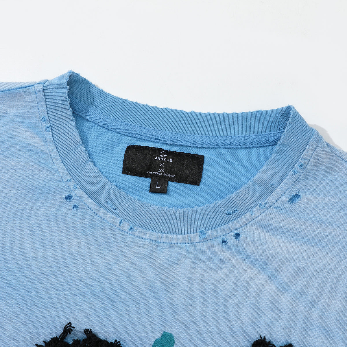 Arkyve X Basquiat Faces Long Sleeve in blue, Arkyve x Jean-Michel Basquiat neck label