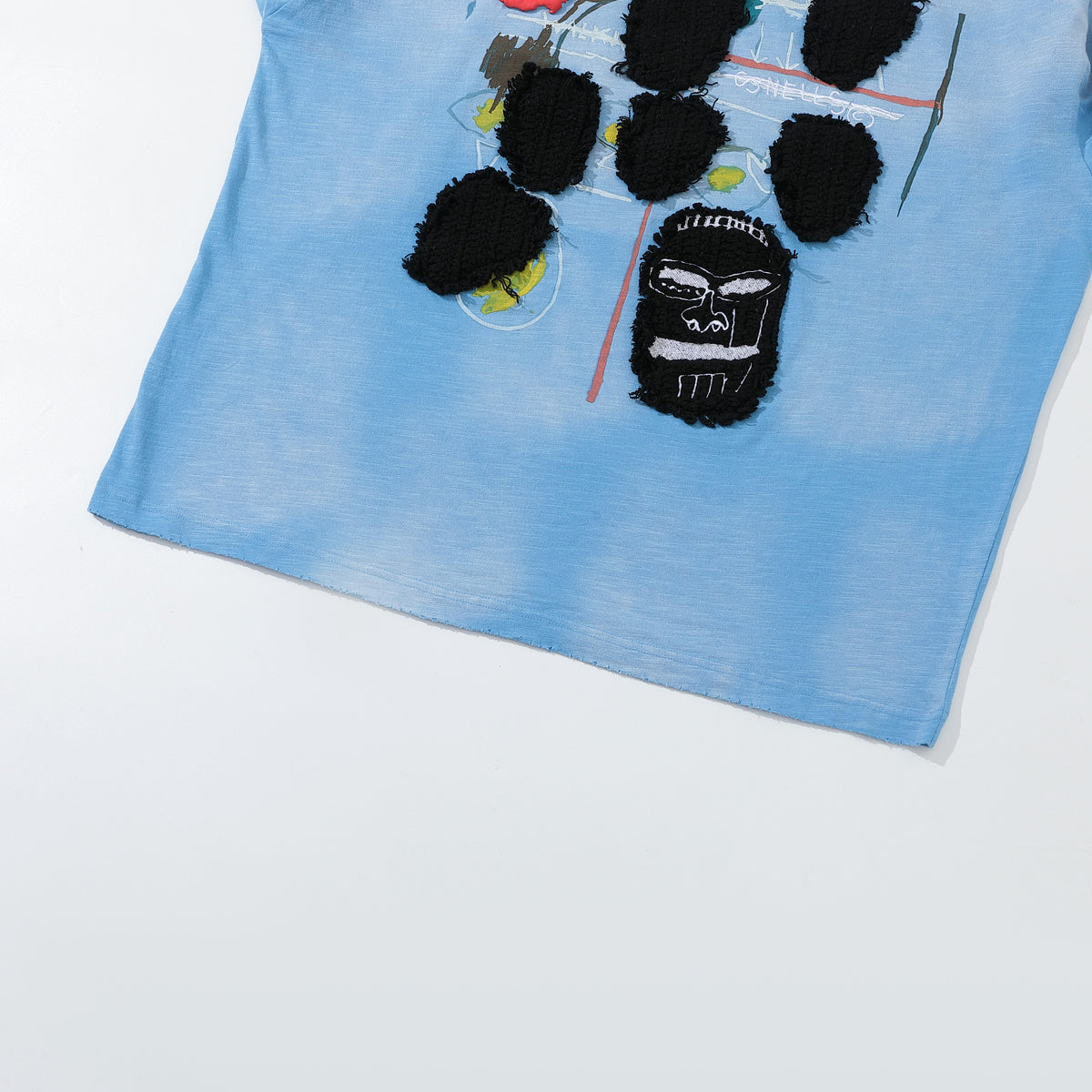 Arkyve X Basquiat Faces Long Sleeve in blue, hem detail