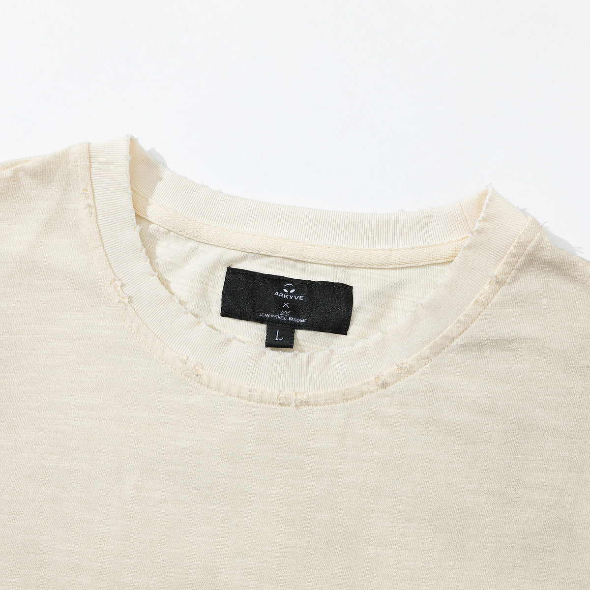Arkyve X Basquiat Too Much Reign Tee, Arkyve x Jean-Michel Basquiat neck label