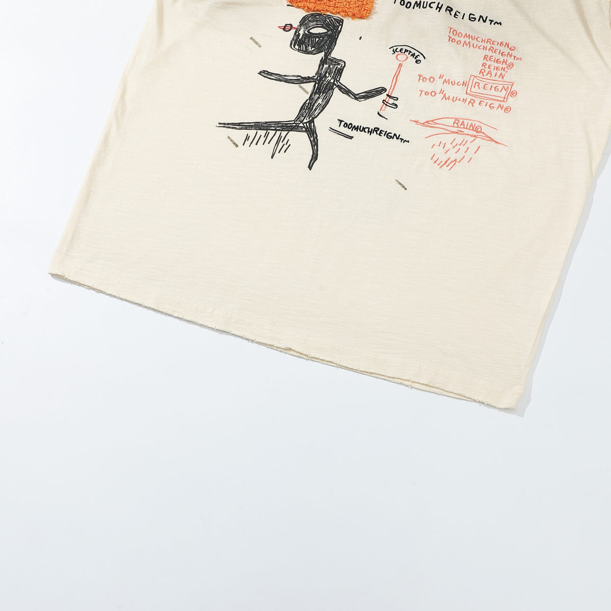 Arkyve X Basquiat Too Much Reign Tee, hem detail